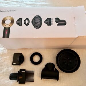 Dyson supersonic hairdryer - black.  Used less than 30 times.